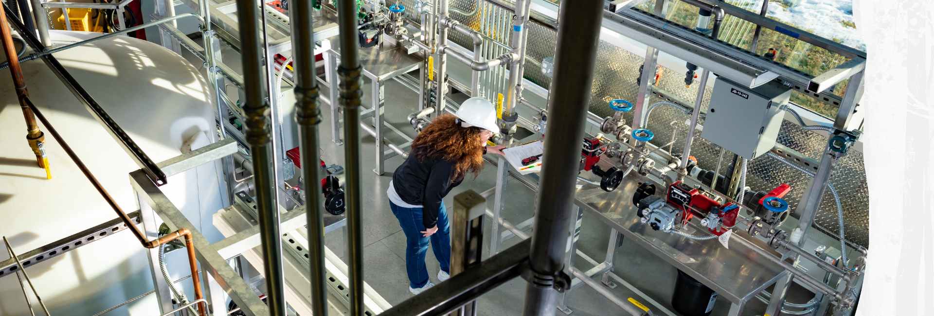 Student Marcia Lea learns on the Process Technology “Big Silver” simulator at UAA’s Kenai Peninsula College Kenai River Campus Career & Technical Center.